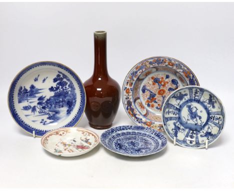 Five Chinese porcelain saucers and dishes and a sang de boeuf glazed vase, vase 21cm high