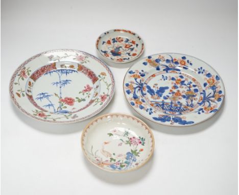 A collection of 18th century Chinese export plates and saucers