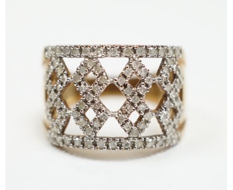 A modern 9ct gold and diamond chip cluster set dress ring, size P, gross weight 4.8 grams.