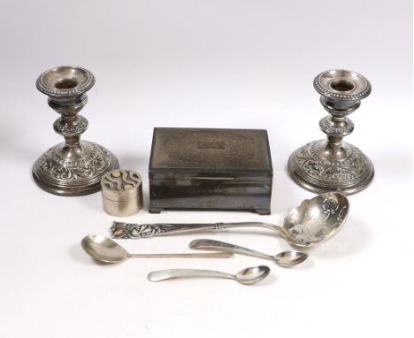 Sundry silver including a cigarette box, pair of dwarf candlesticks, modern silver circular pill box and three spoons, maker 