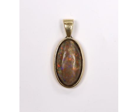 A yellow metal mounted oval black opal pendant, overall 30mm, gross weight 4 grams.