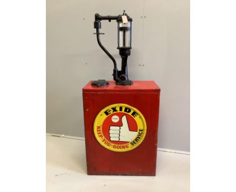 A vintage American Exide engine oil pump, width 58cm, depth 32cm, height 130cm