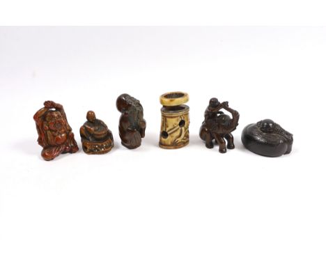 A group of six Japanese netsuke in wood, staghorn and lacquer, 19th century and later