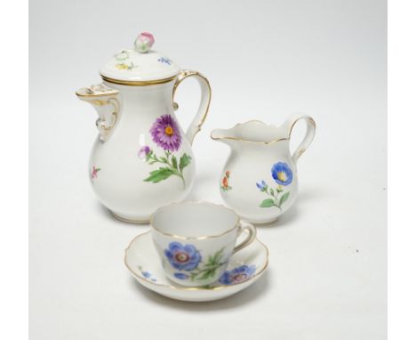 A 20th century Meissen coffee set with floral decoration, comprising a coffee pot, a milk jug, a lidded sugar bowl, and six c