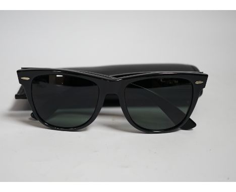 A pair of vintage Ray Ban Wayfarer sunglasses, with case and box, virtually unused.