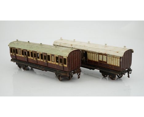 Two Marklin 0 gauge tinplate LNWR coaches; a First Third composite and a Full Guard’s vanBoth coaches are play worn with some