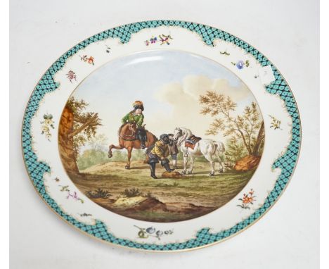A Meissen style dish decorated with a hunting party, 35.5cm diameter