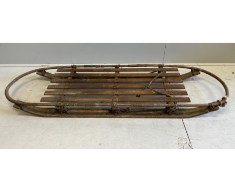 A large vintage wooden sled, length 220cm