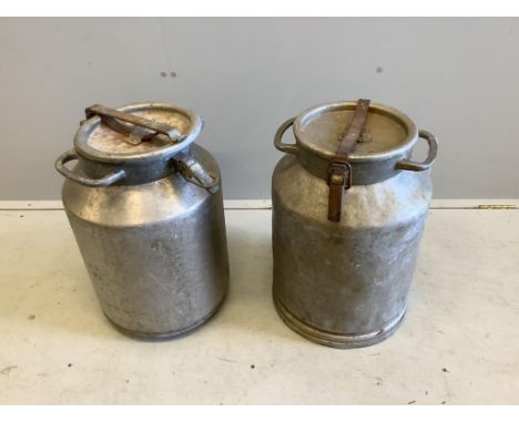 A pair of vintage galvanised milk churns, height 52cm