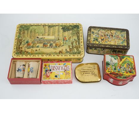 A collection of Disney Snow White memorabilia, including a porcelain set of eight figures by Goebel, W. Germany, together wit