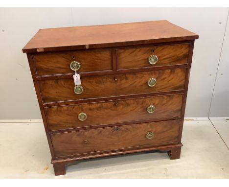 A Georgian mahogany straight front chest of two short and three long drawers, brass ring handles on square bracket feet, widt