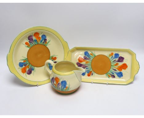 A Clarice Cliff Crocus jug and two dishes, largest 30cm long