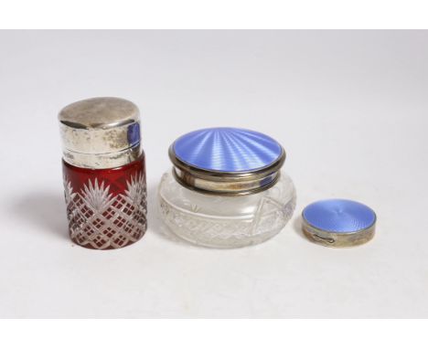 A silver and enamel compact, a silver and enamel mounted glass jar and an Edwardian silver mounted cut glass salts jar by Wil