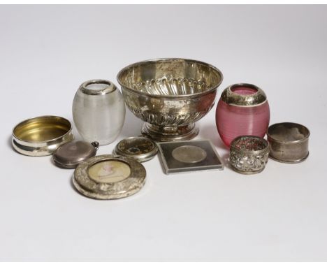 A collection of small silver, to include two mounted glass match strikes, one with cranberry glass, 71mm, a demi fluted bowl,