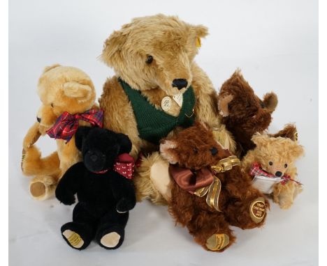 A large 1906 Steiff orange label, two Merrythought John Lewis bears, a black Merrythought bear, an artist bear and a Merrytho