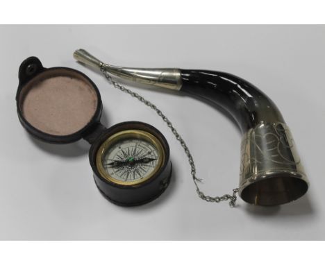 A CASED COMPASS TOGETHER WITH A WHITE METAL HORN 