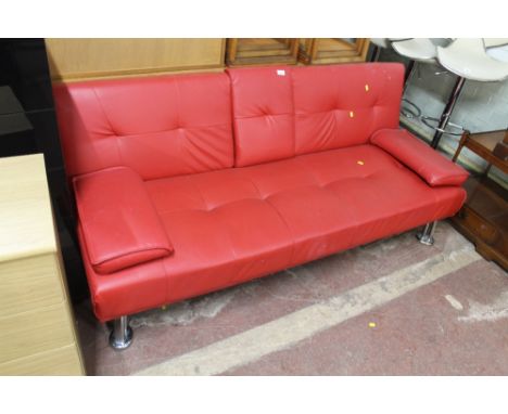 A MODERN RED SOFA BED 