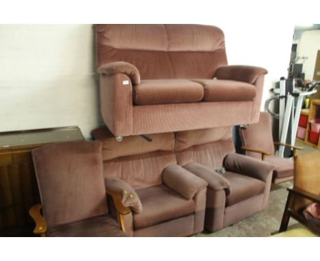 A PARKER KNOLL SUITE CONSISTING OF A TWO SEATER SOFA, TWO ARM CHAIRS AND TWO WINGBACK CHAIRS 