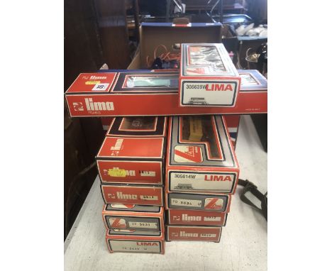 Ten Lima goods wagons including BP and Oxford District Gas