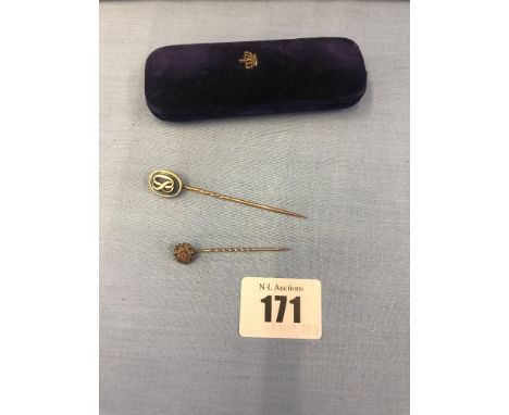 A yellow metal and enamel monogrammed lapel pin dated on reverse 24th May 1897 in blue leather box with mounted crown, inside