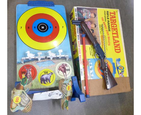 A Marx Targetland Rifle Range and two rifles, boxed