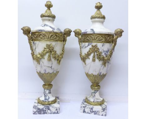 A pair Louis XVI revival marble and gilt decorated mantel urns, c.1920, 52cm, 24.8kg
