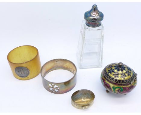 A white metal and enamel box, a continental silver napkin ring, a 925 silver pill box, etc.