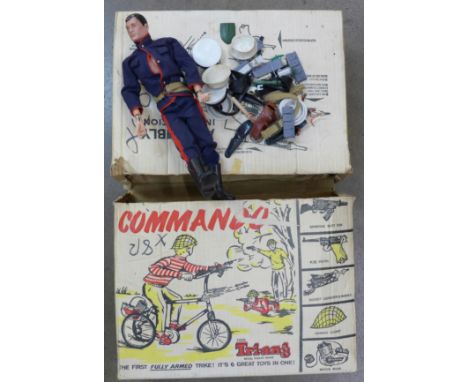 An Action Man and clothes and accessories