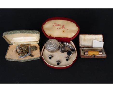 A mixed lot including 9ct gold banded amber cheroot holder, white metal cufflinks and studs etc