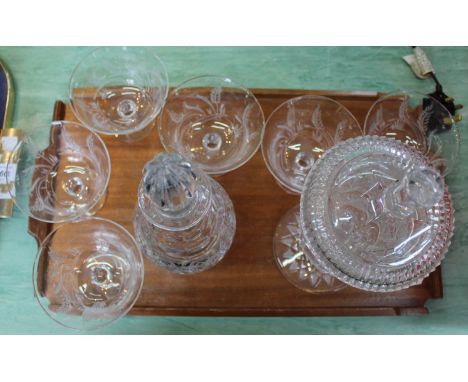 A cut glass lidded jar, a decanter plus six engraved sundae dishes