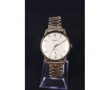 A gents 9ct gold Everite wristwatch with sub seconds dial on flexi strap
