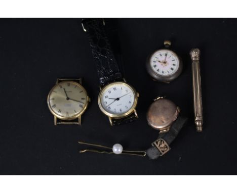 A mixed lot including a lady's 9ct gold watch, a gents Baume watch etc