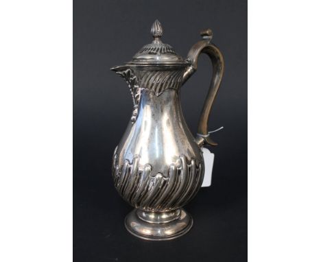 A silver coffee pot with ribbed detail on pedestal base by William Hutton &amp; Sons, London 1894