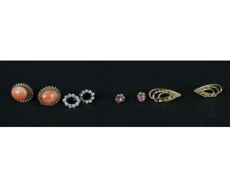 Four pairs of 9ct gold earrings, three stone set