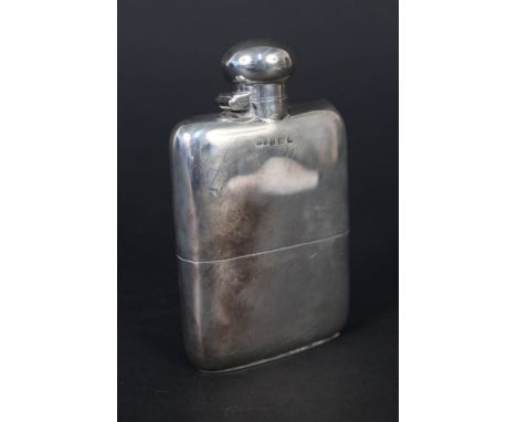 A silver hip flask with detachable cup (slight split to top edge), hallmarked Birmingham 1913 by Charles &amp; Edwin Turner