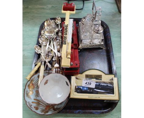Various cutlery, cruet and toys plus a Japanese cup and saucer