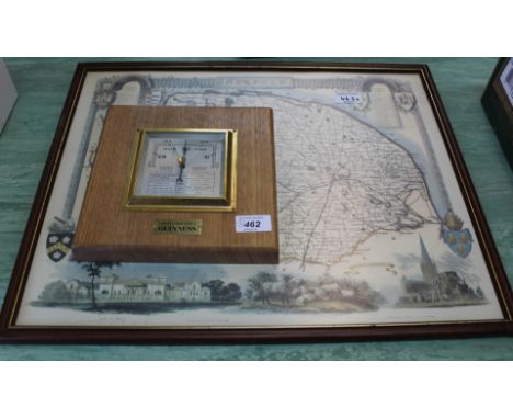 A Guinness barometer plus a map of Norfolk