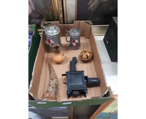 A box of sundries to include lantern, steins , pottery puzzle ball etc