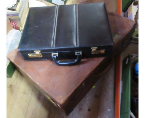 A vintage suitcase and a briefcase