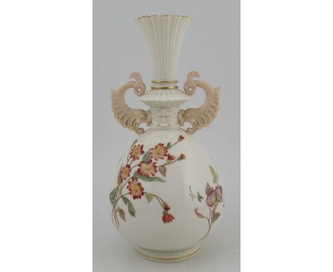 A Royal Worcester vase, decorated with flowers, with stylized dolphin handles, shape No 1327, height 10.75ins&nbsp;Condition 