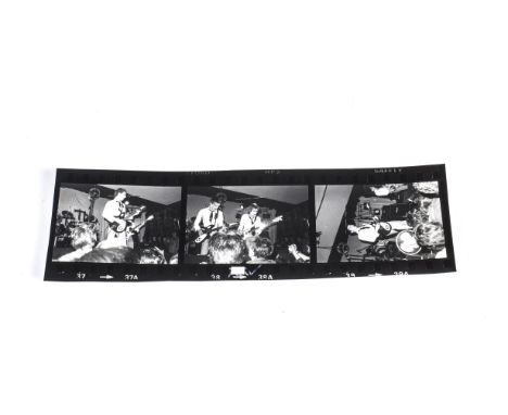 The Jam, The Jam Photo Contact Sheet - three photos showing the band playing live at a London venue circa 1976-77 - sheet mea