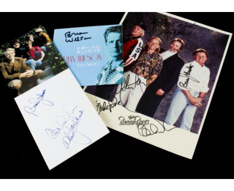 Beach Boys / Signatures, four items comprising a colour photo of the band with signatures of Mike Love, Alan Jardine, Bruce J