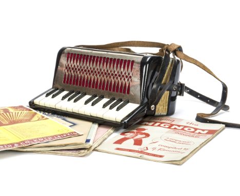 Hohner Mignon II Accordion, two octave with Black and red body and in full working order - some rusting on the front panel, o