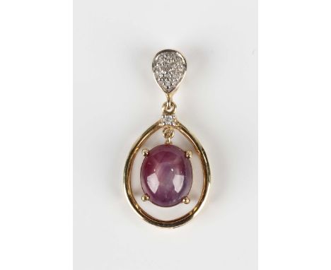 A 9ct gold, star ruby and diamond pendant, claw set with the oval star ruby within an openwork surround, with a diamond set s