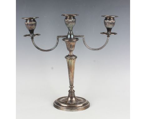 A George III silver oval candlestick base with beaded and engraved decoration, Sheffield 1787 by John Younge &amp; Co, width 