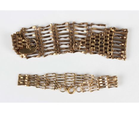 A gold bar and twisted bar link gate bracelet on a 9ct gold heart shaped padlock clasp, length 19cm, and a 9ct gold gate brac