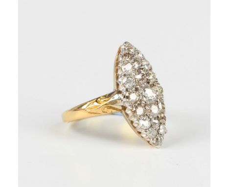 A gold, silver set and diamond marquise shaped cluster ring, mounted with cushion and circular cut diamonds, unmarked, weight