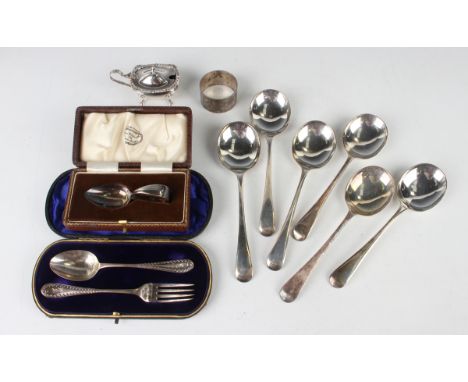 A late Victorian silver christening fork and spoon, Birmingham 1898, cased, a silver mustard, Birmingham 1977, a silver napki