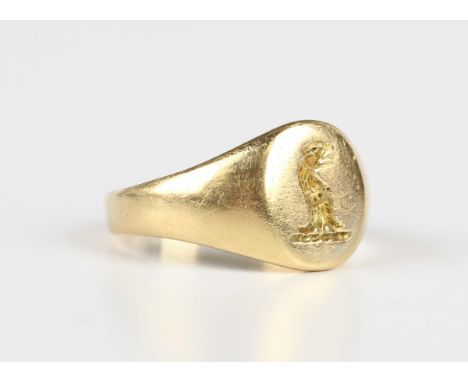 An 18ct gold signet ring, crest engraved, Birmingham 1997, weight 5.4g, ring size approx K.Buyer’s Premium 29.4% (including V