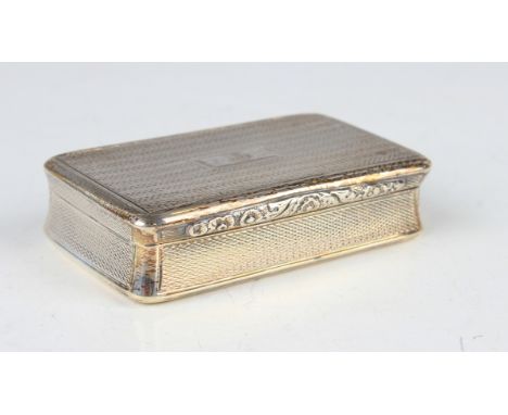 A George IV silver rectangular snuff box with overall engine turned decoration, the hinged lid with scroll thumbpiece, Birmin